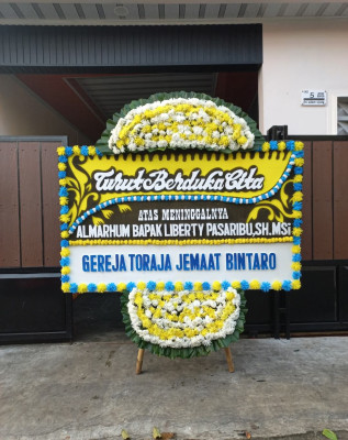 Papan Bunga Duka di Debong Tengah